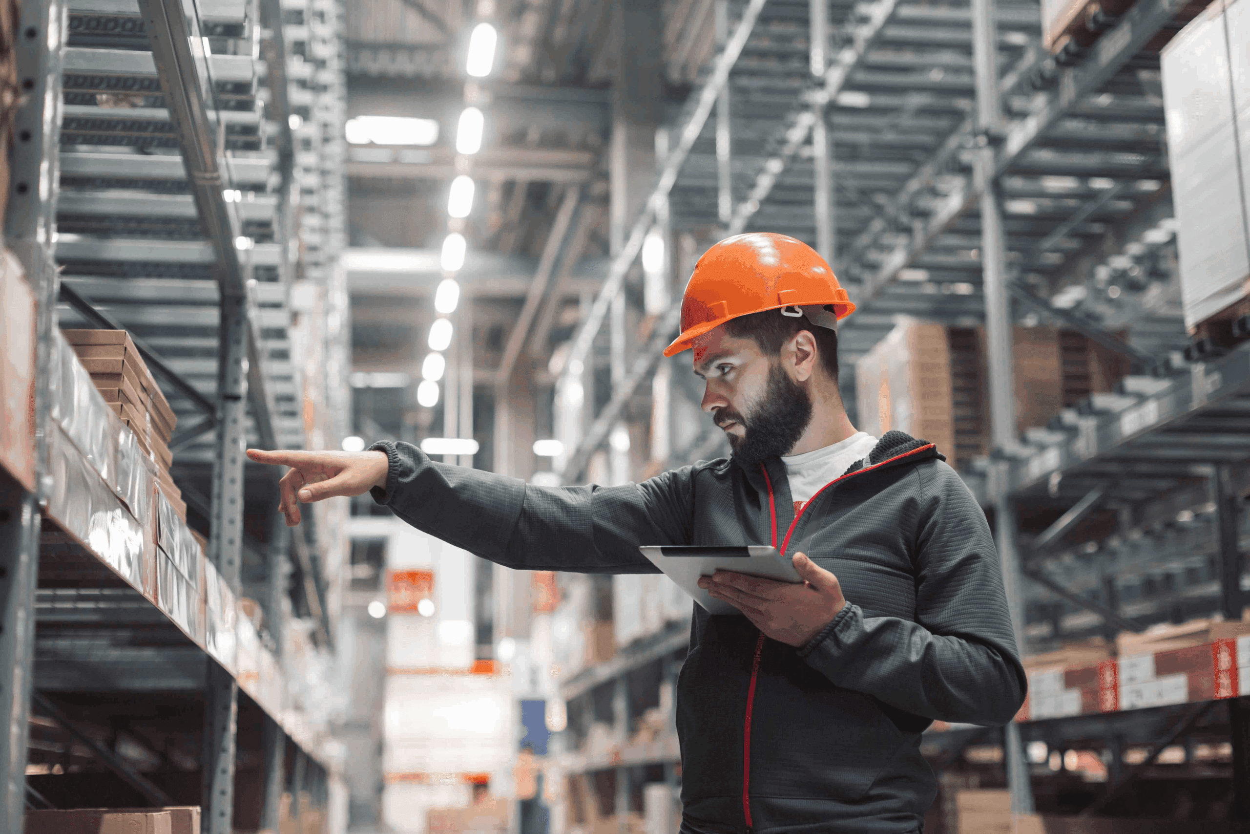 man pointing at boxes